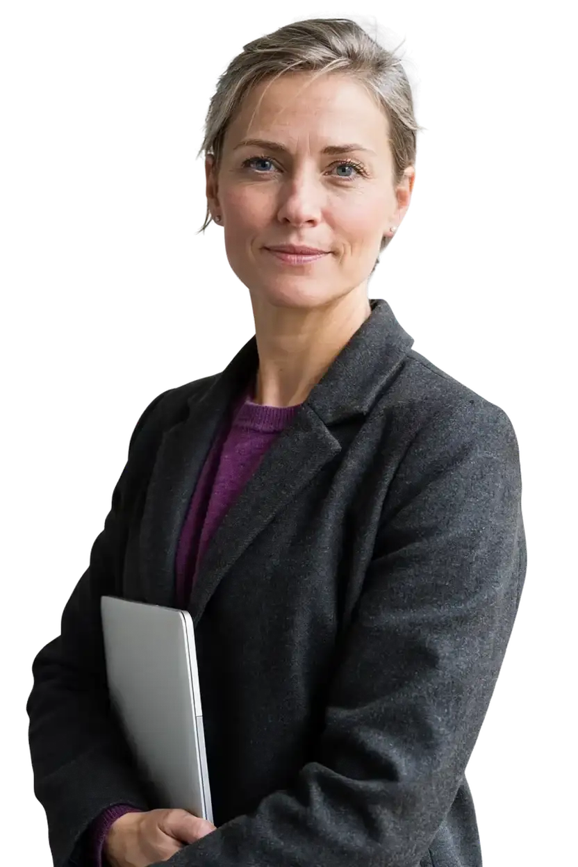 A head of IT security holding a laptop, looking at the viewer